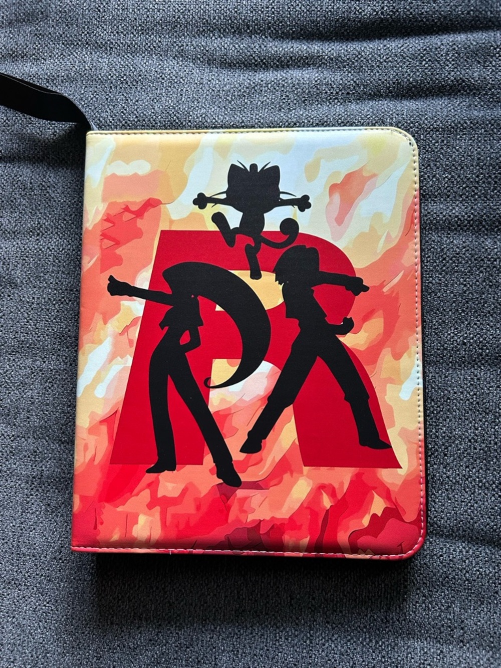 Pokeman Team Rocket 9 Pocket Binder. Comes with A Sealed Pack Of 9 Pocket Pages.